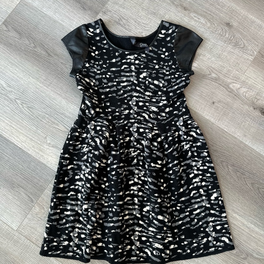 2/20$ Girls faux leather sleeve dress size L